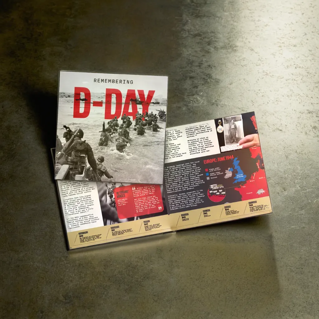 a book is open to a page that says remembering d-day on a steel surface